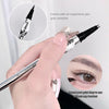 Eyebrow pen with ergonomic design and correction capabilities, held by a hand.