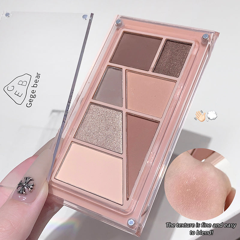 Makeup palette with various shades held by a hand, with 'cege bear' branding.