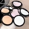 Compact powder cases in different colors on a neutral background