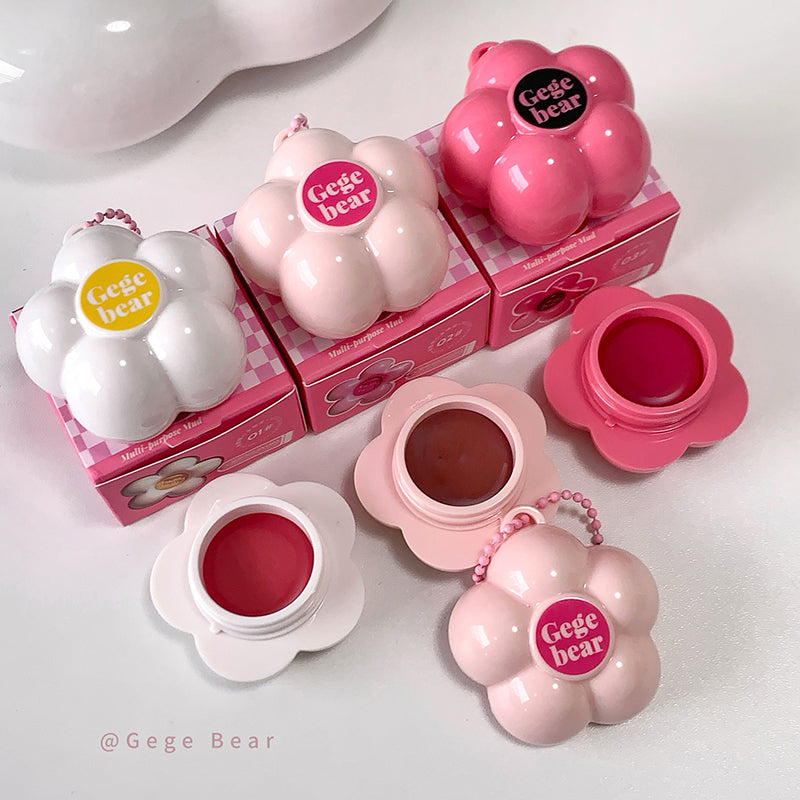 Pink and white cosmetic products with 'Gege bear' branding on a light background