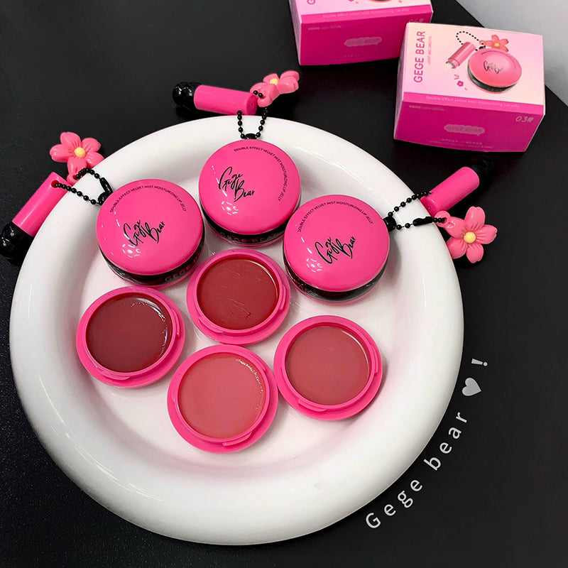 Set of pink makeup products with 'Gege Bear' branding on a white plate.