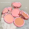 Pink blush compact with 'GEGE BEAR' branding held by a hand against a neutral background.