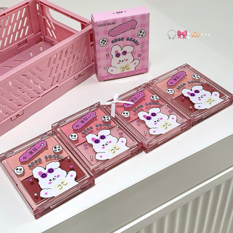 Set of pink cosmetic cases with cartoon character design on a white surface.