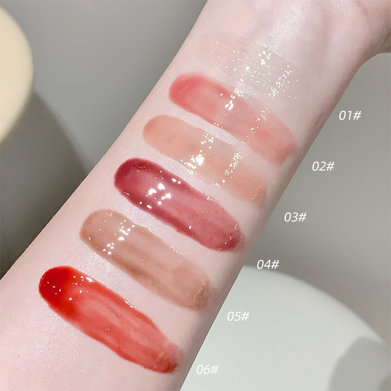 Lipstick swatches on a person's arm with color codes labeled.