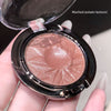 Compact powder with a mashed potato texture effect applied