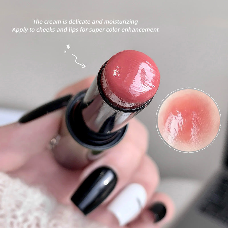 Lipstick with a close-up of the cream texture on a blurred background