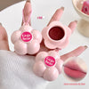Pink lip balm with 'Gege bear' branding held by a hand, showing close-up of lip balm and inset of lips.