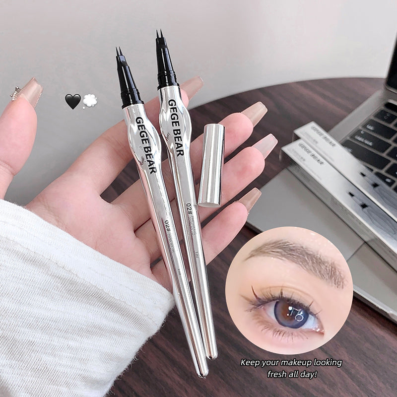 Two GEUGEBAEER eyebrow pencils held by a hand with a close-up of an eye and eyebrow on a desk.