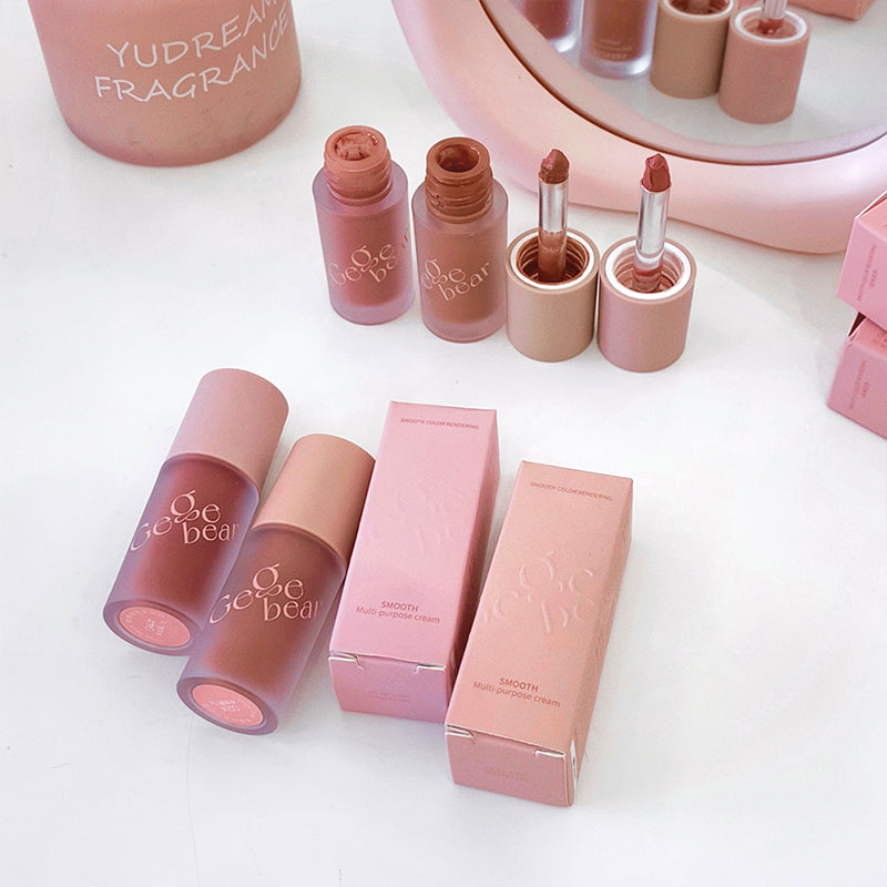 Pink lip products with visible brand name on a white background