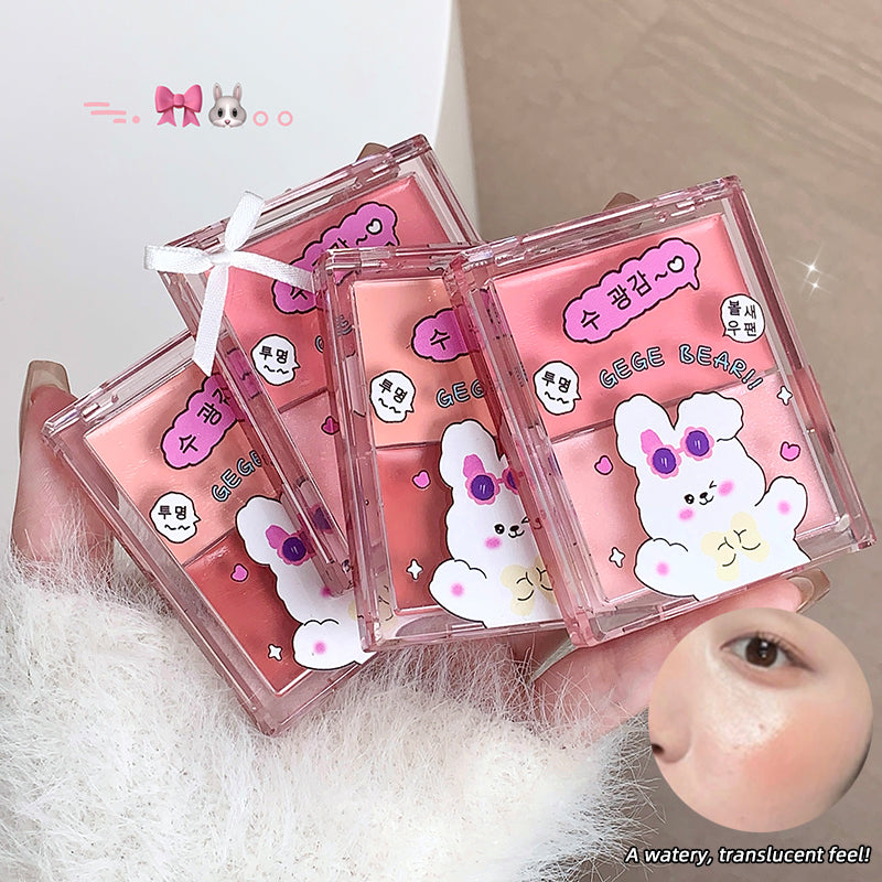 Four pink packaging cases with cartoon character designs on a white surface.