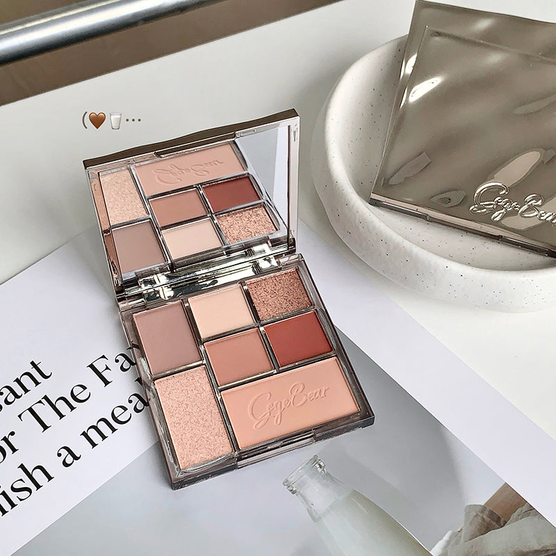 Makeup palette with Gege Bear logo on a white surface