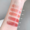 Lipstick swatches on a person's arm with color codes