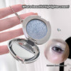 Compact mirror with glittery cream and a makeup application on a white background