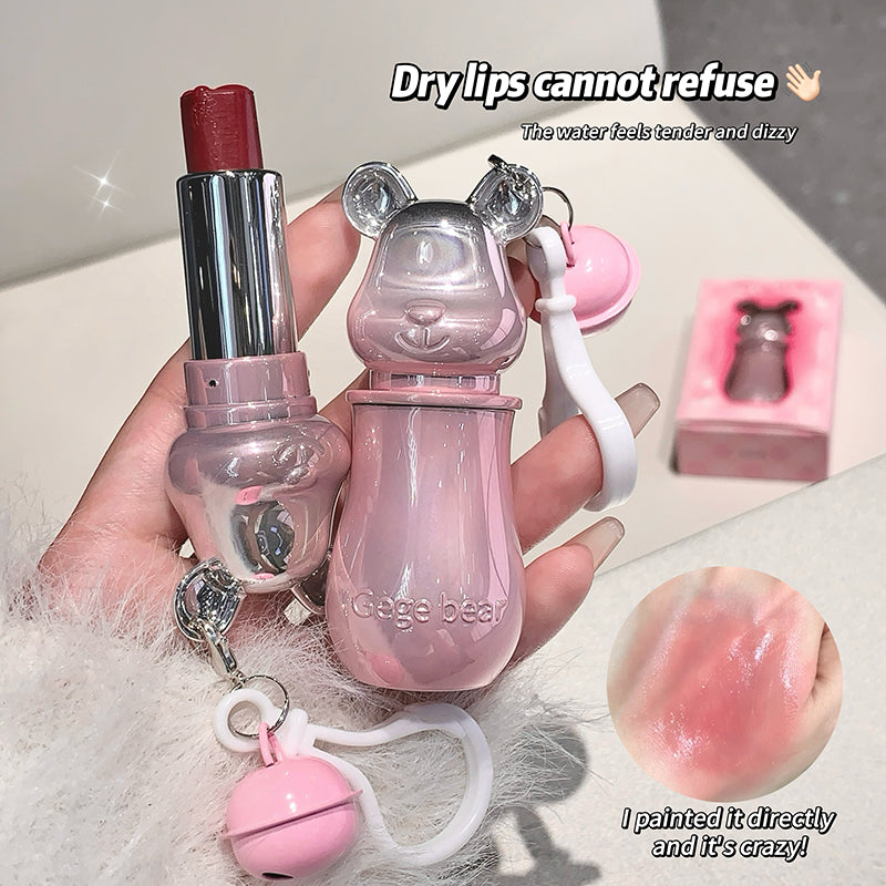 Pink lip balm with bear design held by a hand, with text about dry lips and a close-up of lips.
