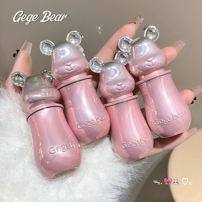 Pink bear-shaped containers with 'Gege Bear' branding held in a hand.