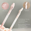 Two makeup brushes with detailed text on a gray background