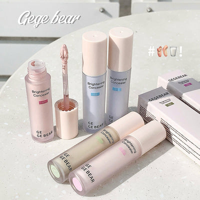 Cosmetic products with 'Gee bear' branding on a light surface.