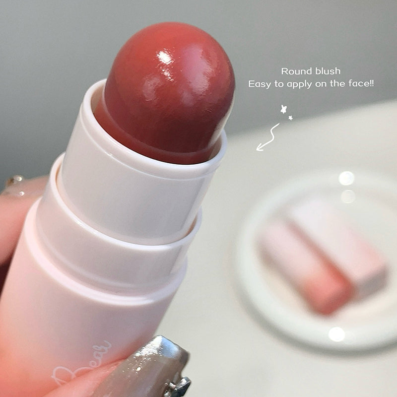 Round blush stick with a blurred background