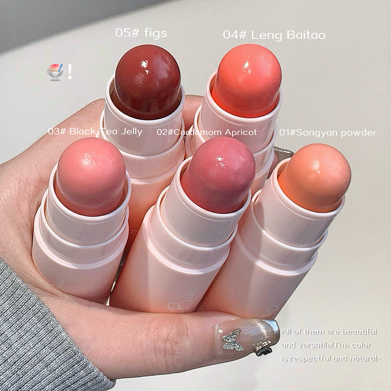 Hand holding five lip balms with color swatches and text labels on a light background