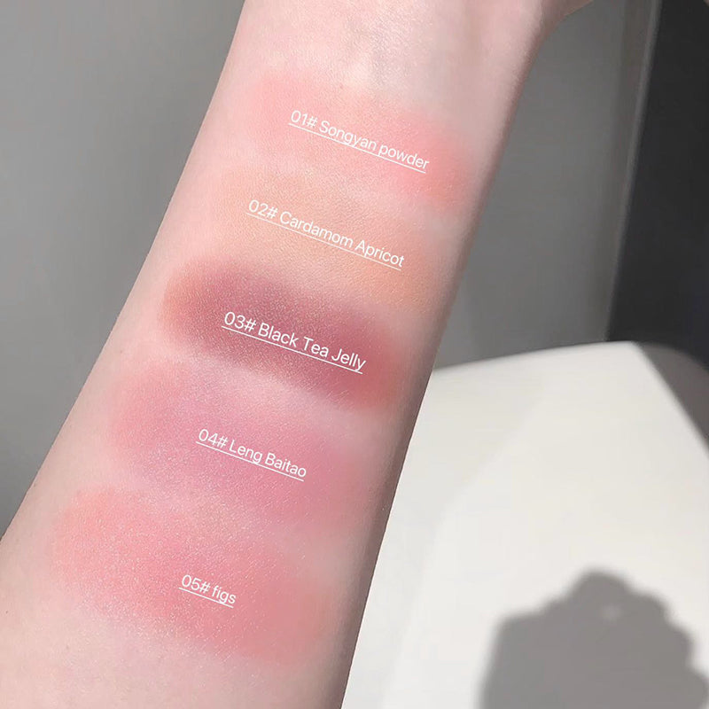 Color swatches on a wrist with labeled shades of blush.
