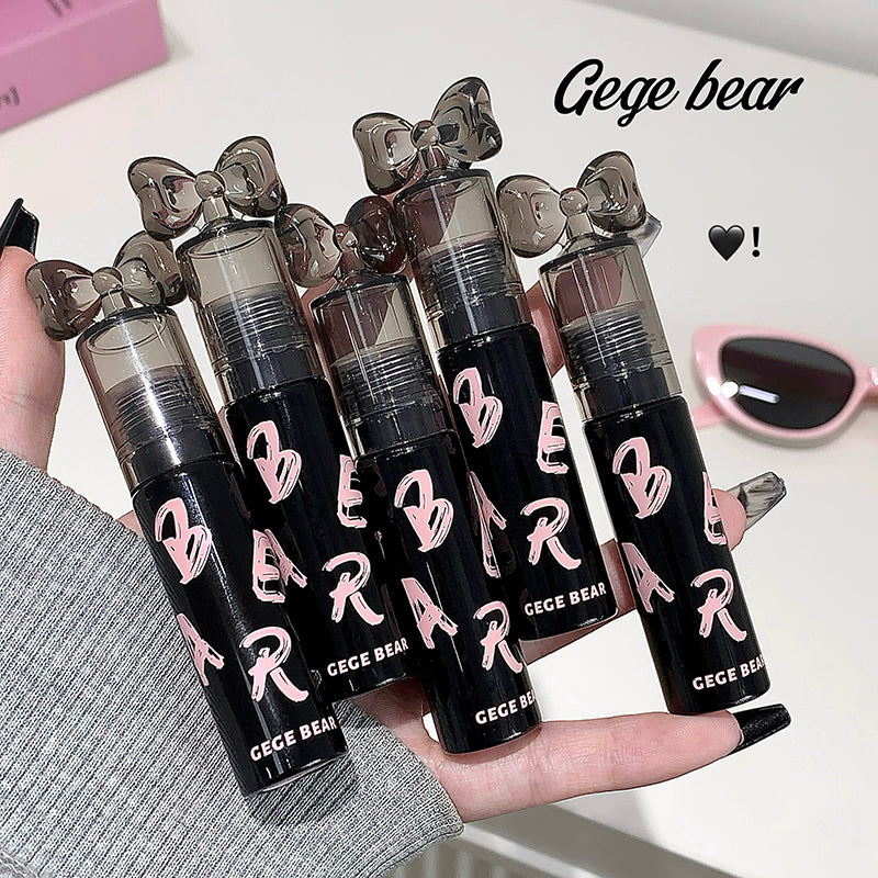 Five black lip gloss tubes with 'Gege Bear' branding held in a hand.