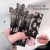 Lip gloss set with 'GECE BEAR' branding, held by a hand, on a white background.
