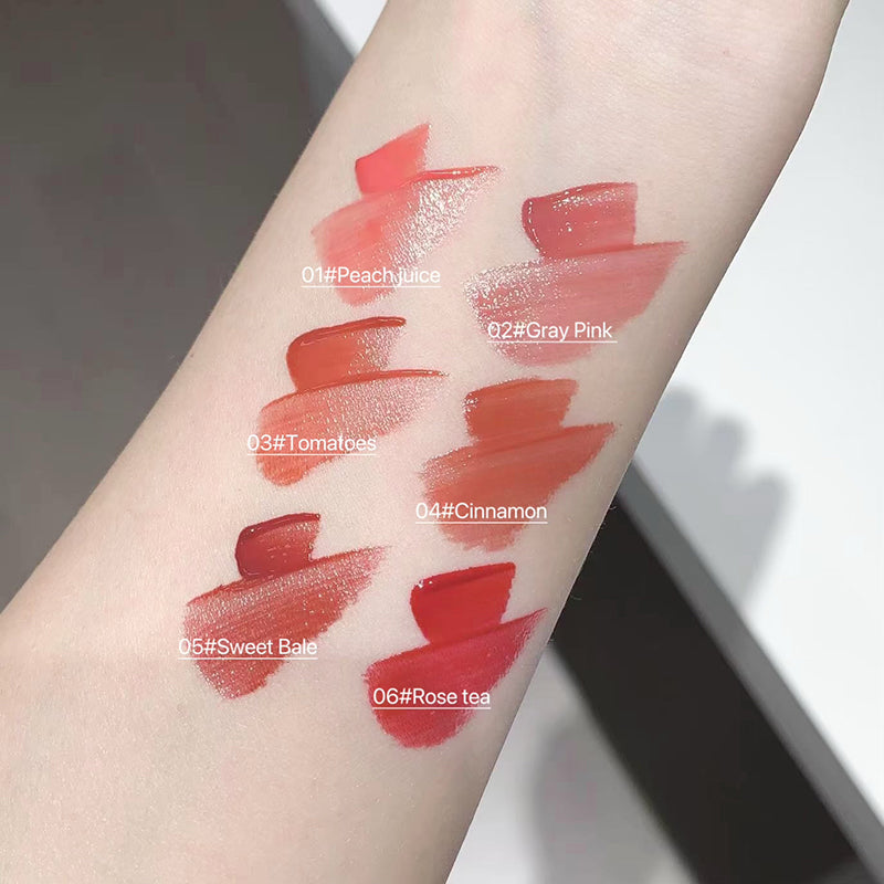 Lipstick swatches on a person's arm with color names and codes.