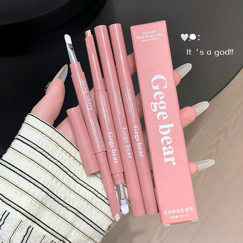 Set of Gege bear lip liner pens with packaging held by a hand.