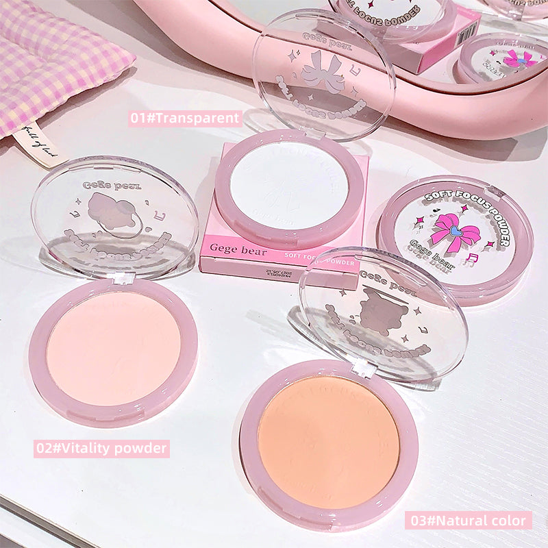 Makeup powders in pink cases with 'Gege bear' branding on a light background
