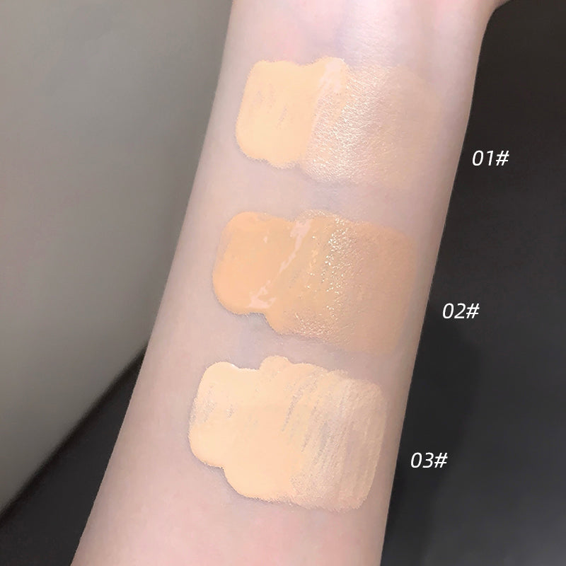 Three swatches of a cosmetic product on a person's arm with labels 01#, 02#, and 03#. The background is neutral.