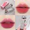 Collage of a silver lipstick with pink packaging, applied on lips, and held by a hand.