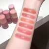 Lipstick swatches on a person's arm with six different shades labeled.