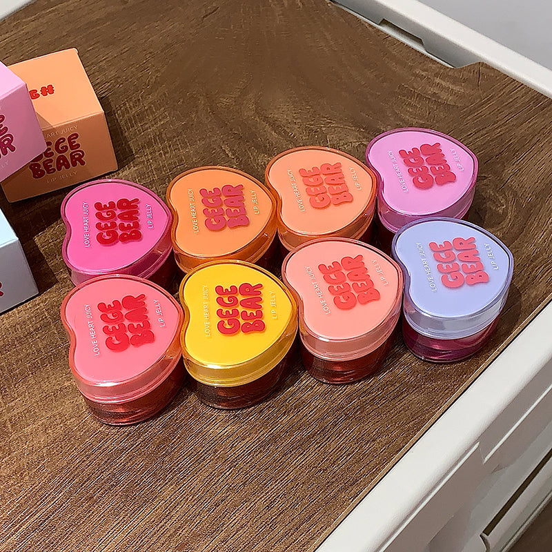 Heart-shaped containers with 'CECE BEAR' text on a wooden surface