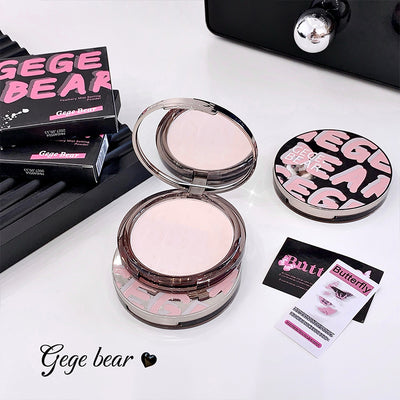 Makeup compact with open lid, packaging, and accessories on a white surface with 'Gege Bear' branding.
