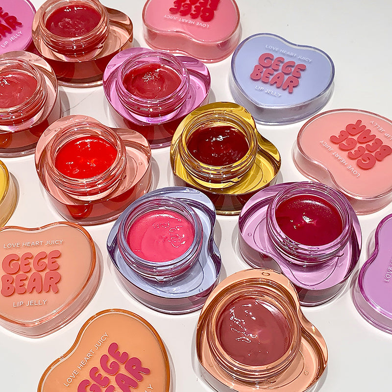 Collection of Gege Bear lip jelly jars in various colors on a white background