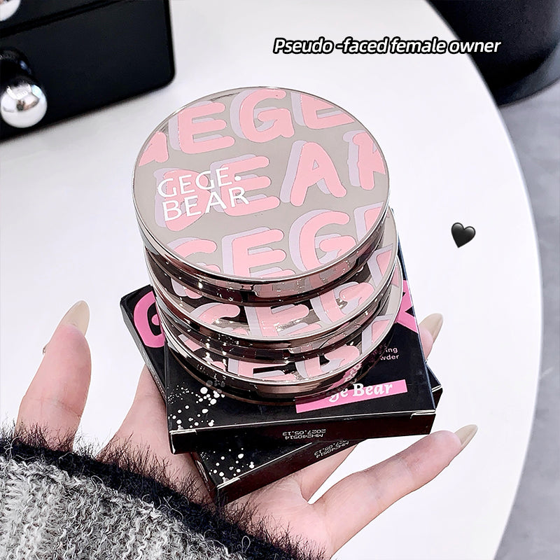Stack of GECE BEAR makeup products held by a hand on a light background