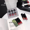 Gege Bear lip products displayed on a white surface with a magazine underneath.