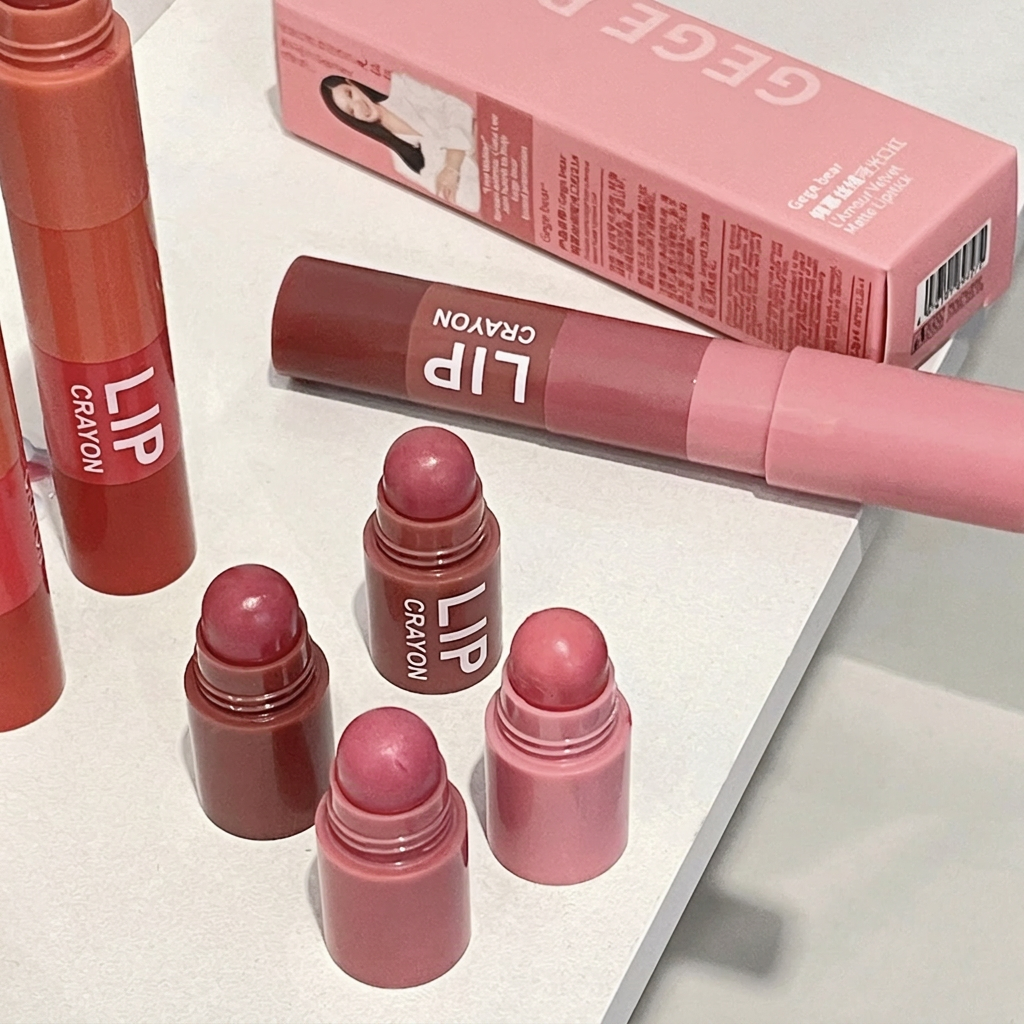 Set of Crayon Lip products with a pink box in the background
