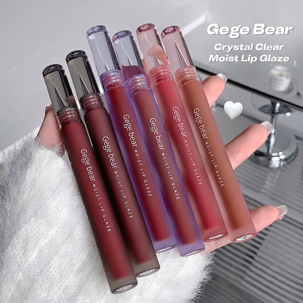 Set of Gege Bear Crystal Clear Moist Lip Glaze lip glosses held by a hand.