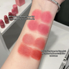 Lipstick swatches on a person's arm with product names and color descriptions.