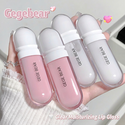 Three GEGBEAR lip gloss bottles held by a hand on a light background