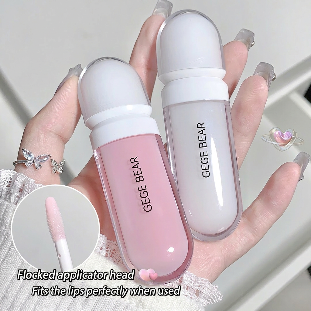 Two lip gloss bottles with 'GEGE BEAR' branding held in a hand.