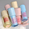 Five small bottles of 'Geege bear' powder lip glaze on a light gray background